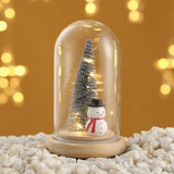 Christmas tree lamp in a glass dome