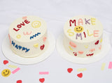 Vanilla Cream Love Cake And Vanilla Cream Smile Cake On A White Background