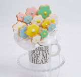 Bouquet Of Flower Shaped Cookies, In Gift Mug On A White Background