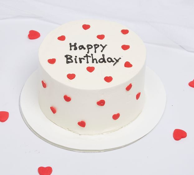 Mini Hearts Layer Cake On A White Background