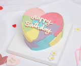 Pastel Heart Birthday Cake On A White Background