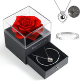 Red Rose Gift , Silver necklace and silver bracelet On A White Background